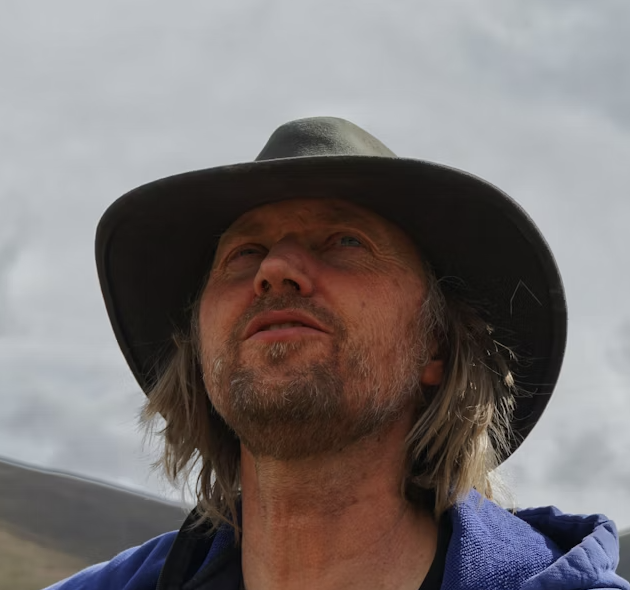 Man wearing wide-brimmed hat